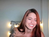 Beautiful redhead teen camgirl singing